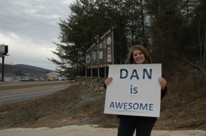 In verse 23, a "Proverbs 31" woman is described as someone whose husband "is respected at the city gates". Here, blogger and author Rachel Held Evans praises her husband "Dan" at the Dayton, Tennesse welcome sign.