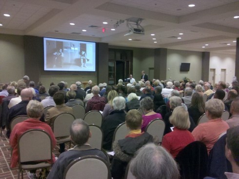 Facts and Faith Symposium attendees prepare to view the first film, Lee Strobel's The Case for a Creator, followed by a panel discussion and Q&A.