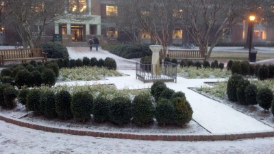 Snow falling on the sundial, in front of Swem Library on the campus of William and Mary, early evening, January 28, 2014.