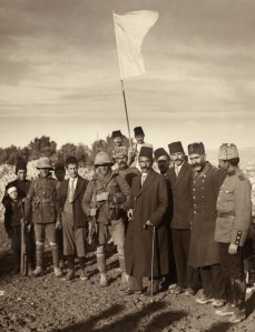 Turkish major (FINALLY) surrenders Jerusalem to British troops in World War One, using a sheet from the Spafford American Colony as a surrender flag.
