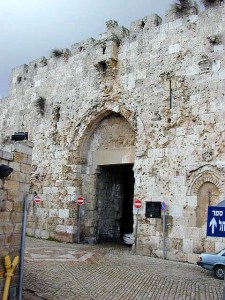 Bullet holes riddle the exterior of the Zion Gate in Jerusalem, a center of conflict during the wars of 1948 and 1967 for control of the Holy City.