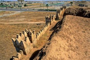 The walls of ancient Nineveh. The walls were excavated and rebuilt in the 20th century, but the Islamic State has damaged this archaeological site in last few years.